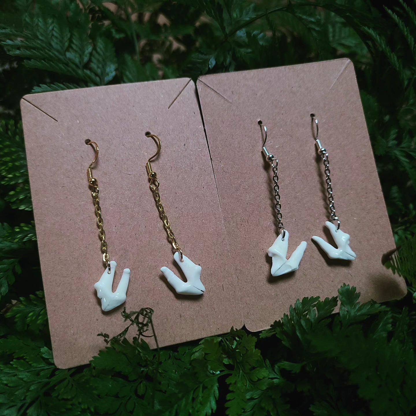 Raccoon tooth dangle earrings