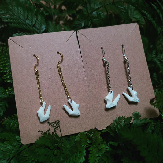 Raccoon tooth dangle earrings