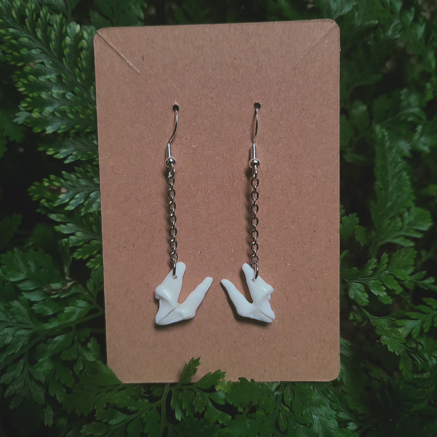Raccoon tooth dangle earrings