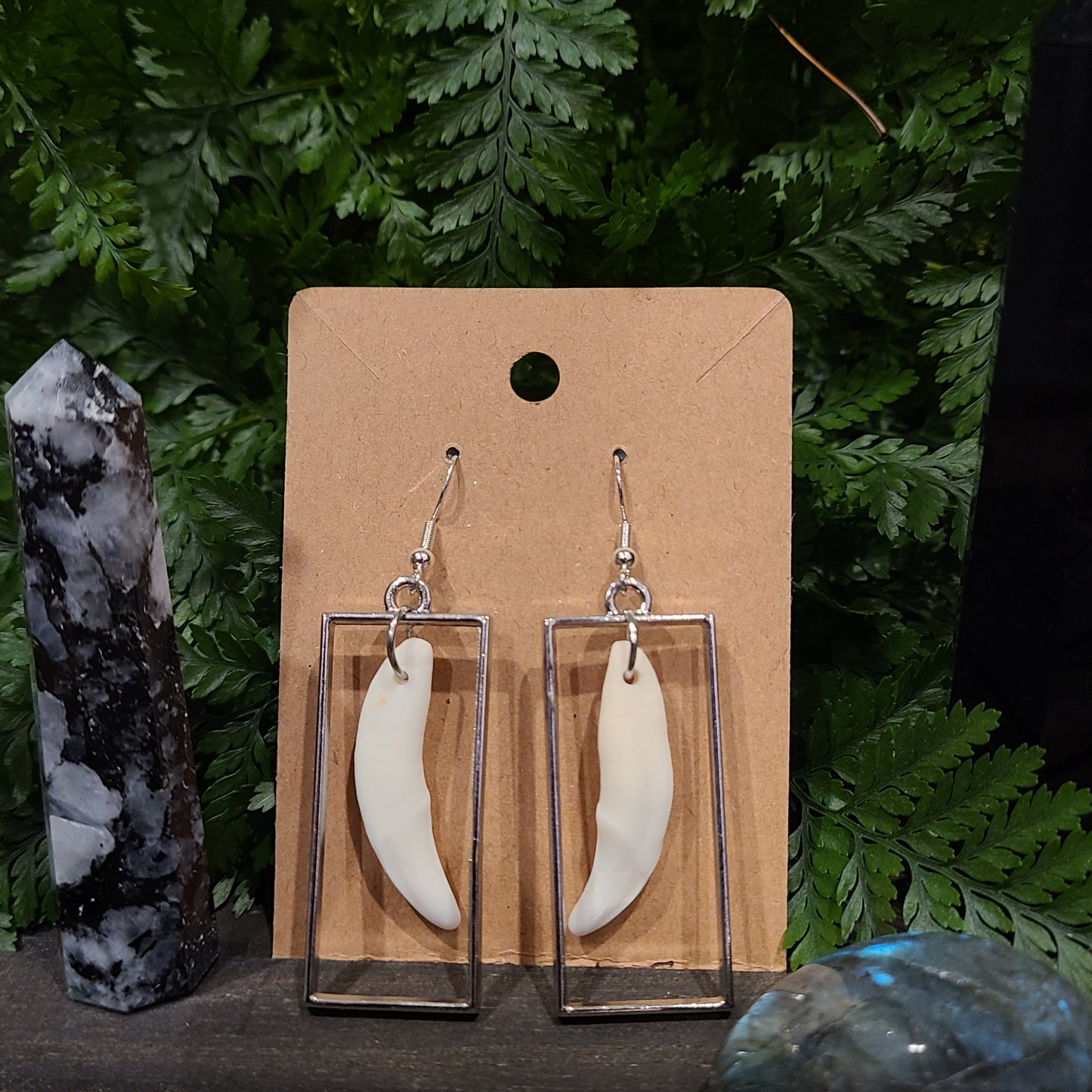 Geometric coyote fang earrings