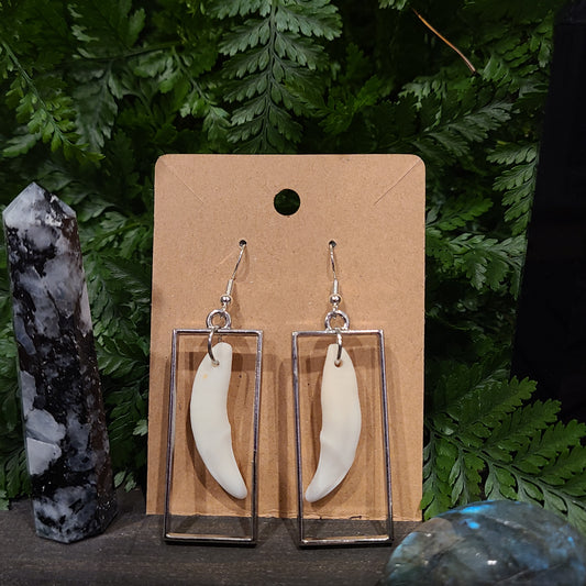 Geometric coyote fang earrings