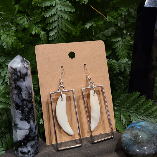 Geometric coyote fang earrings